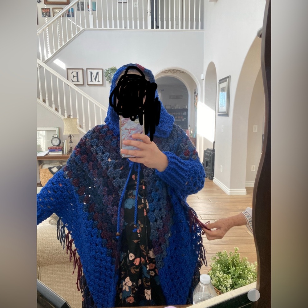 Hand made hooded cape with sleeves.